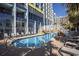 Resort-style pool with lounge chairs and bridge at 6804 N Ocean Blvd. # 1147, Myrtle Beach, SC 29572