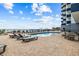 Refreshing outdoor pool with surrounding lounge chairs at 2001 S Ocean Blvd. # 1203, Myrtle Beach, SC 29577