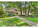 Condo nestled in a wooded area with well-manicured lawns at 204 Baslow Ct. # 20-H, Myrtle Beach, SC 29572