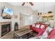 Spacious living room with fireplace and view of dining area at 204 Baslow Ct. # 20-H, Myrtle Beach, SC 29572
