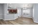 Bright dining area with hardwood floors and kitchen access at 3132 Robins Nest Way, Myrtle Beach, SC 29579