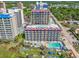 Aerial view of a coastal resort with multiple buildings and pools at 201 77Th Ave. N # 923, Myrtle Beach, SC 29572