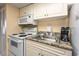 Well-equipped kitchen with granite countertop at 201 77Th Ave. N # 923, Myrtle Beach, SC 29572