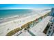 Aerial view showcasing beach, pool, and building at 2301 S Ocean Blvd. # Ph22, Myrtle Beach, SC 29577