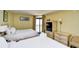 Guest bedroom with two double beds and balcony access at 2301 S Ocean Blvd. # Ph22, Myrtle Beach, SC 29577