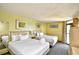 Guest bedroom with two double beds and ocean view at 2301 S Ocean Blvd. # Ph22, Myrtle Beach, SC 29577
