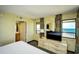 Bedroom with ocean views, dresser, and ensuite bathroom access at 2301 S Ocean Blvd. # Ph22, Myrtle Beach, SC 29577
