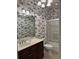 Bathroom with nautical wallpaper, vanity, and tub shower at 249 Venice Way # 3105, Myrtle Beach, SC 29577