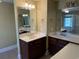 Double vanity bathroom with updated fixtures and mirror at 249 Venice Way # 3105, Myrtle Beach, SC 29577