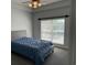 Bedroom with large window, carpet, and ceiling fan at 249 Venice Way # 3105, Myrtle Beach, SC 29577