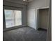 Secondary bedroom with closet and neutral carpeting at 249 Venice Way # 3105, Myrtle Beach, SC 29577