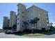 Exterior view of the building with parking in front at 249 Venice Way # 3105, Myrtle Beach, SC 29577