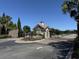 Gated entrance to community with landscaping at 249 Venice Way # 3105, Myrtle Beach, SC 29577