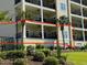Exterior view of building, showcasing private balcony at 249 Venice Way # 3105, Myrtle Beach, SC 29577