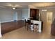 Modern kitchen with hardwood floors, ample cabinetry and breakfast bar at 249 Venice Way # 3105, Myrtle Beach, SC 29577