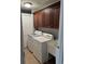 Laundry room with washer, dryer, and upper cabinets at 249 Venice Way # 3105, Myrtle Beach, SC 29577