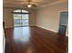 Bright and spacious living room with hardwood floors and access to balcony at 249 Venice Way # 3105, Myrtle Beach, SC 29577