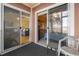 Screened balcony with sliding glass doors and partial water view at 4633 Lightkeepers Way # 5-C, Little River, SC 29566