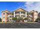Attractive condo building with parking and landscaping at 4633 Lightkeepers Way # 5-C, Little River, SC 29566