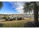 Peaceful marina view with palm trees and landscaping at 4633 Lightkeepers Way # 5-C, Little River, SC 29566