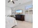 Bright bedroom with a king-size bed and a dresser at 4739 Cloisters Ln., Myrtle Beach, SC 29577