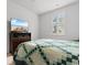Bedroom with TV, dresser and window with shutters at 4739 Cloisters Ln., Myrtle Beach, SC 29577