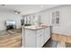 Kitchen with island, granite countertops, stainless steel appliances, and hardwood floors at 4739 Cloisters Ln., Myrtle Beach, SC 29577