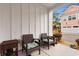 Small patio with wicker chairs and potted plants at 4739 Cloisters Ln., Myrtle Beach, SC 29577