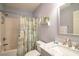 Clean bathroom with a marble countertop and shower/tub combo at 598 Blue Stem Dr. # 52D, Pawleys Island, SC 29585