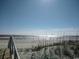 Scenic beach view with calm ocean and sandy shore at 598 Blue Stem Dr. # 52D, Pawleys Island, SC 29585
