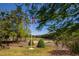 Scenic view of golf course with flag and trees at 598 Blue Stem Dr. # 52D, Pawleys Island, SC 29585
