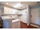 Well-equipped kitchen with white cabinets and appliances at 598 Blue Stem Dr. # 52D, Pawleys Island, SC 29585