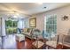 Spacious living room with hardwood floors and access to a balcony at 598 Blue Stem Dr. # 52D, Pawleys Island, SC 29585