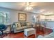 Bright living room featuring hardwood floors and ample natural light at 598 Blue Stem Dr. # 52D, Pawleys Island, SC 29585