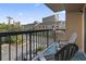 Balcony with chairs, rug, and ocean view at 7500 Ocean Blvd. N # 6010, Myrtle Beach, SC 29572