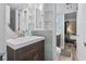 Small bathroom with toilet and sink at 7500 Ocean Blvd. N # 6010, Myrtle Beach, SC 29572