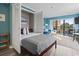 Small bedroom with a murphy bed, offering space-saving design at 7500 Ocean Blvd. N # 6010, Myrtle Beach, SC 29572