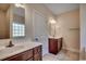 Elegant bathroom with double vanity and tile flooring at 100 Barons Bluff Dr., Conway, SC 29526