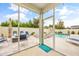 Relaxing screened porch overlooking the pool and backyard at 1054 Graybill Lane, North Myrtle Beach, SC 29582