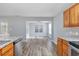 View of kitchen, dining area, and sunroom at 1108 Patricia Ct., Conway, SC 29526