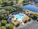 Community pool with surrounding lounge area and landscaping at 1109 Blue Stem Dr. # 34D, Pawleys Island, SC 29585