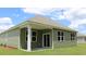 Rear view of house showing patio and windows at 1180 Maxwell Dr., Little River, SC 29566