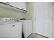 Laundry room with washer, dryer, and ample storage at 1413 Half Penny Loop, Conway, SC 29526