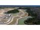 Aerial view of a new housing development with ponds and lush landscaping at 202 Carver Willow Dr., Loris, SC 29569