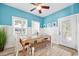 Charming dining area with wooden table, bench, and coastal accents at 206 Hillside Dr. S, North Myrtle Beach, SC 29582