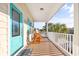 Relaxing front porch with rocking chairs, overlooking the street at 206 Hillside Dr. S, North Myrtle Beach, SC 29582