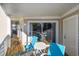Private balcony with table and chairs, perfect for relaxing outdoors at 300 Shorehaven Dr. # I-2, North Myrtle Beach, SC 29582
