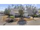 Gray house with a two-car garage and landscaping at 301 Climbing Vine Ct., Conway, SC 29526