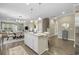 Open kitchen with an island and a view into the dining area at 301 Climbing Vine Ct., Conway, SC 29526