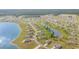 Aerial view of a residential community situated around a serene lake at 408 Clear Lake Dr., Conway, SC 29526